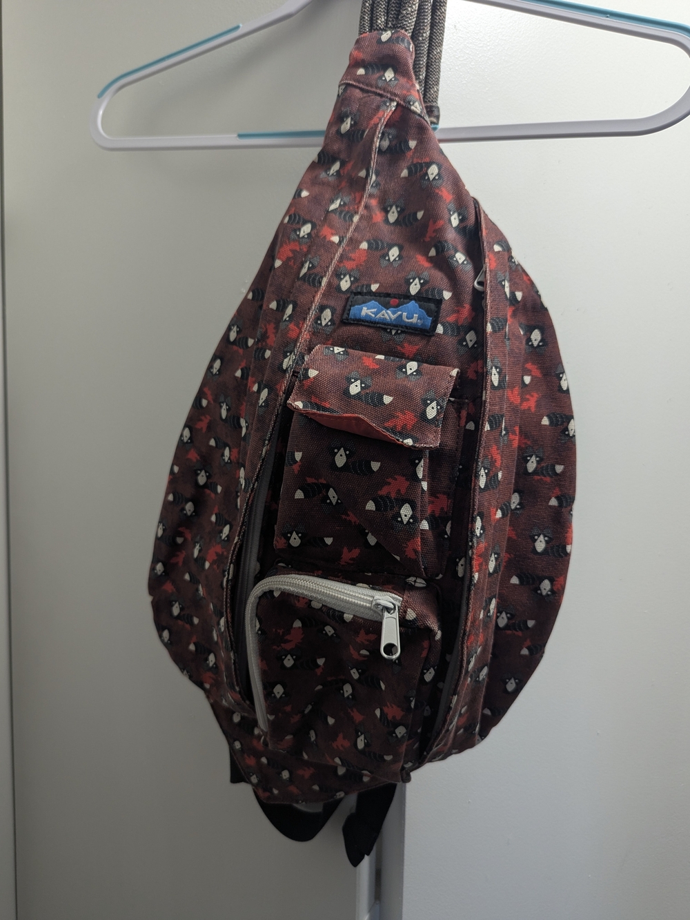 KAVU Sling Bag - Rust Raccoon Print